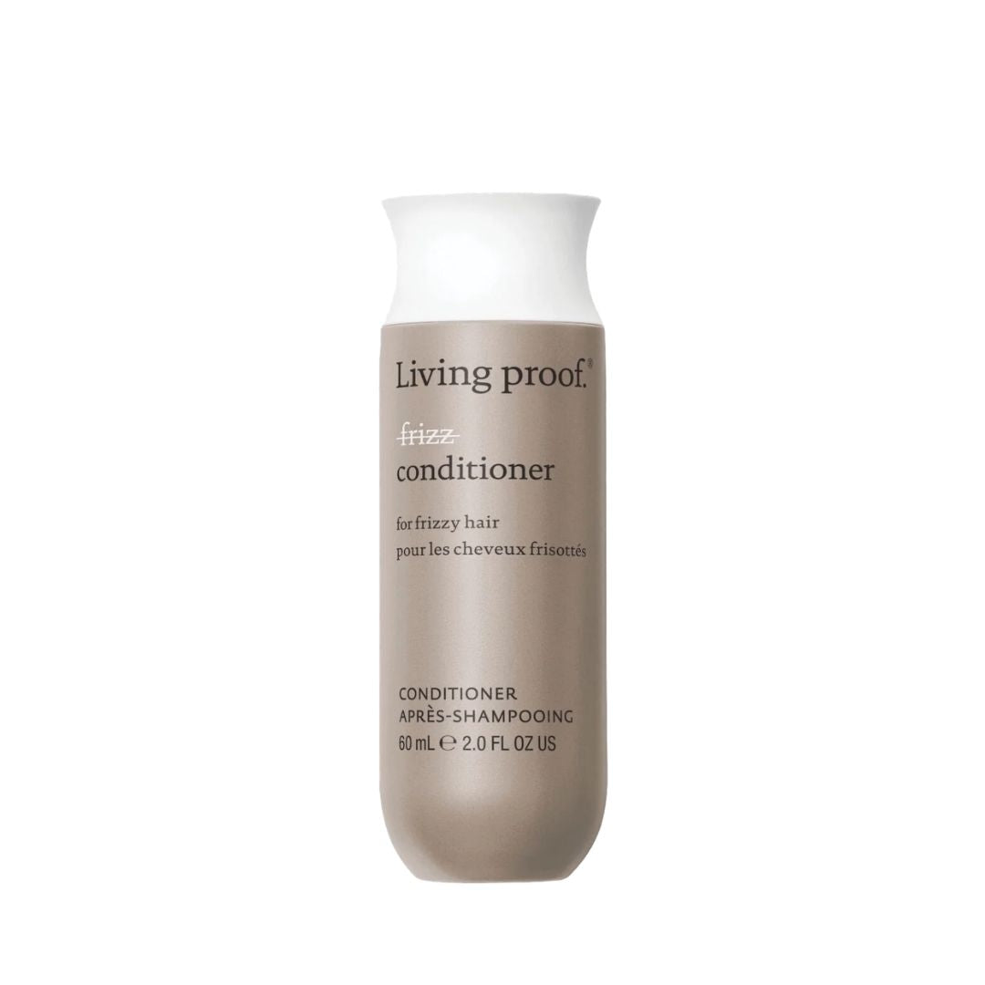 Living Proof Frizz Conditioner in a 2.0 fl oz bottle, featuring a taupe-beige body and a white cap, set against a plain white background.